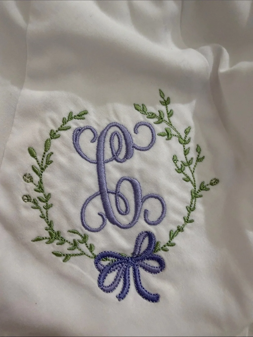 Pair of IC COLLECTIONS White Ruffle Diaper Covers w/ “C” Floral Monograms